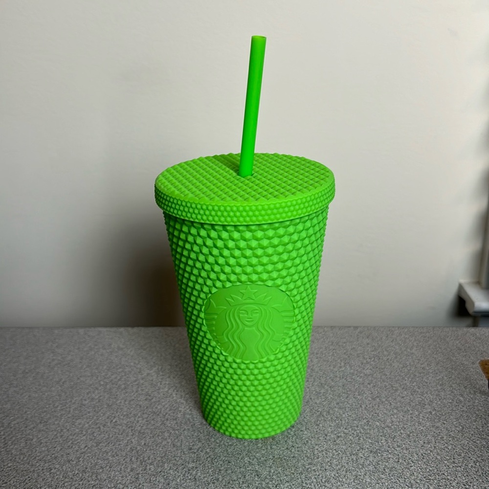 Like green studded Starbucks tumbler